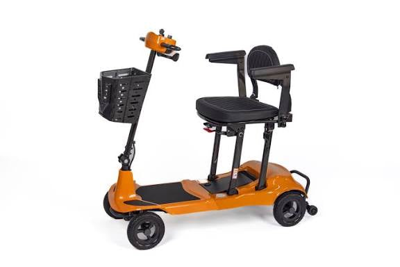 Genie Ultralight folding travel scooter, magnesium and carbon fibre frame.